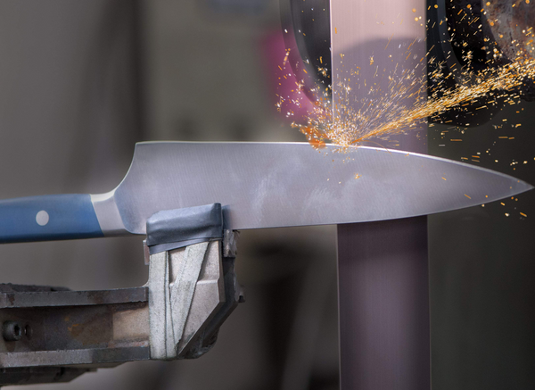 Welding process with sparks flying from a metal object