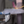 Load image into Gallery viewer, Welding process with sparks flying from a metal object
